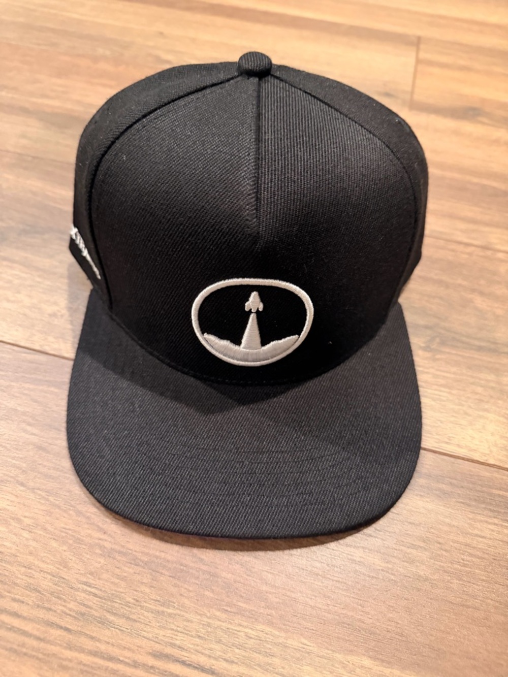 Black Snapback Hat with White Embroidered Logo